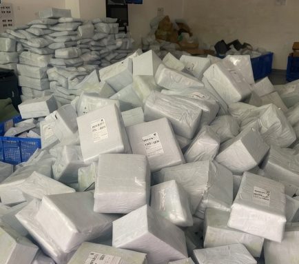 Stacked air parcels in a Shenzhen warehouse