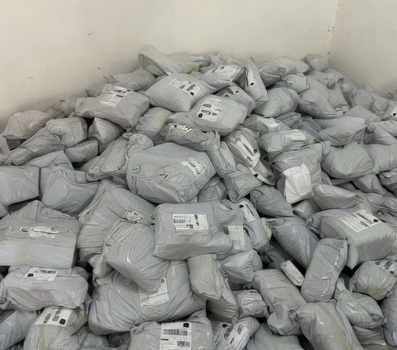 Air DDP parcels piled on the warehouse floor